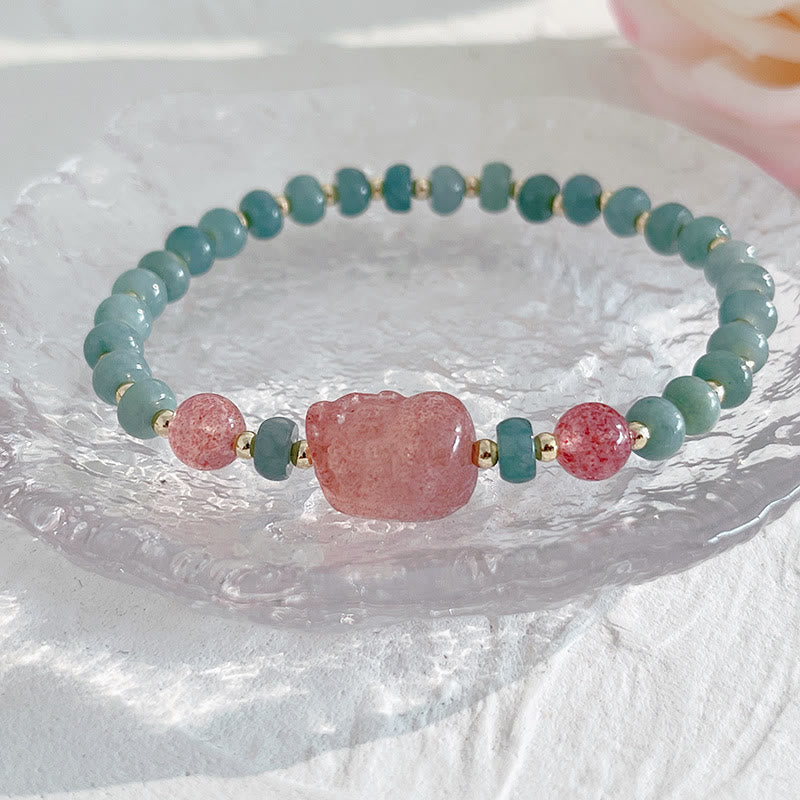 Hetian Jade Pearl Fu Gourd Money Bag Bracelet – Pink strawberry quartz PiXiu on crystal plate close-up, love wealth bracelet