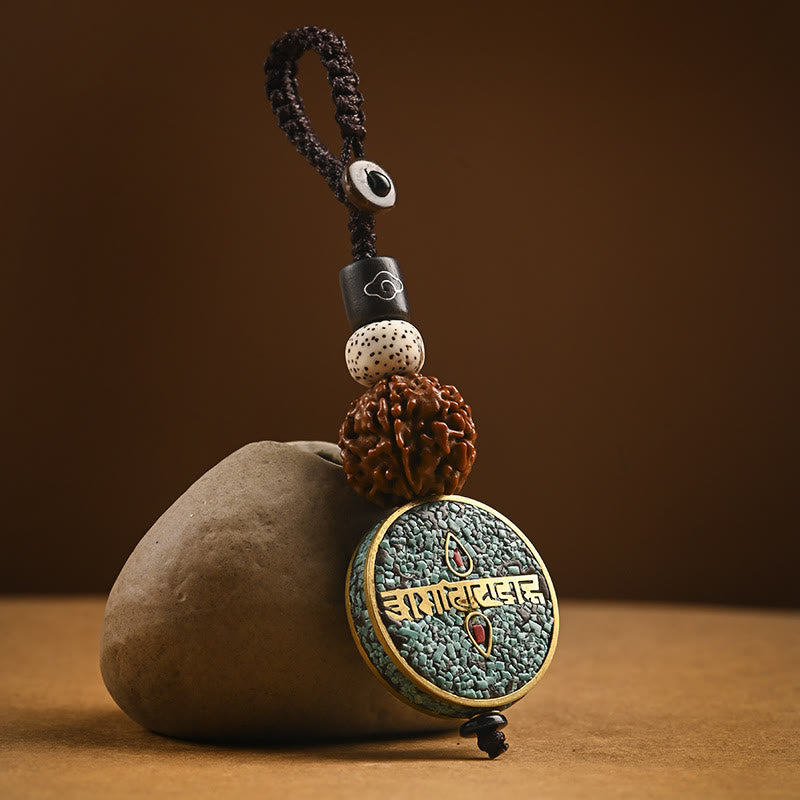 Tibetan Bodhi Seed Peace Key Chain – Turquoise mantra medallion with gold script and rudraksha bead, prayer charm