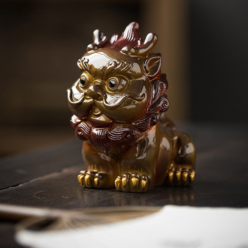 Small PiXiu Tea Pet – Gold PiXiu on dark tea tray with open book beside, zen desk figurine