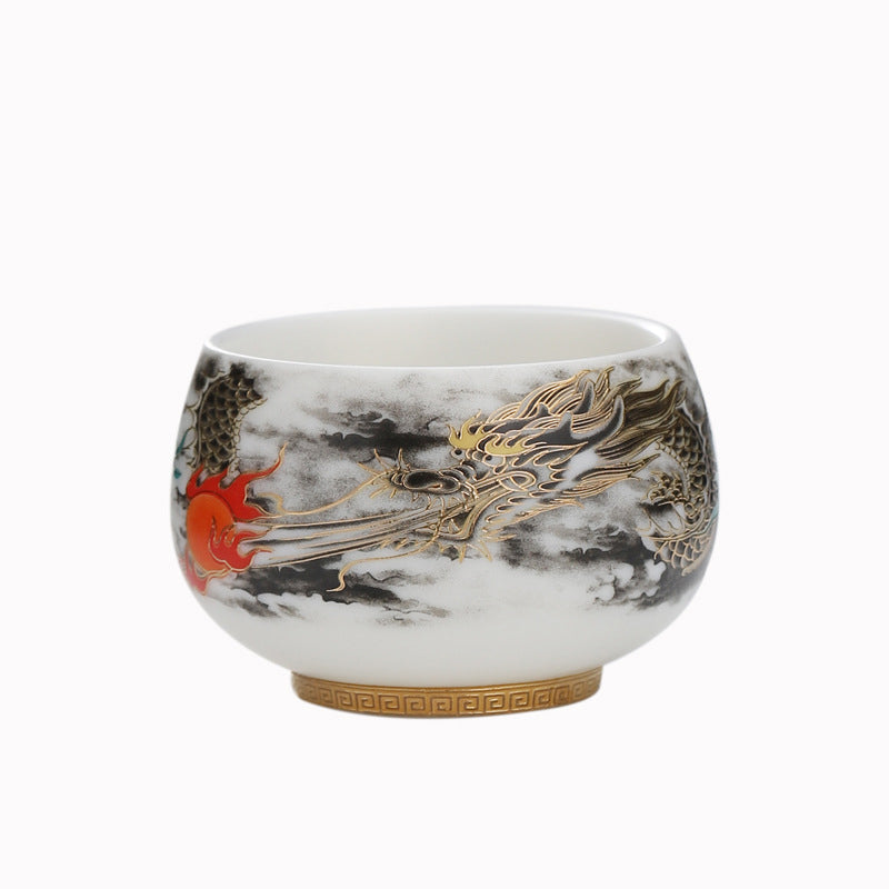 Dragon Playing Pearl Porcelain Teacup – Clean white studio, gold dragon with red pearl among clouds, Greek key base