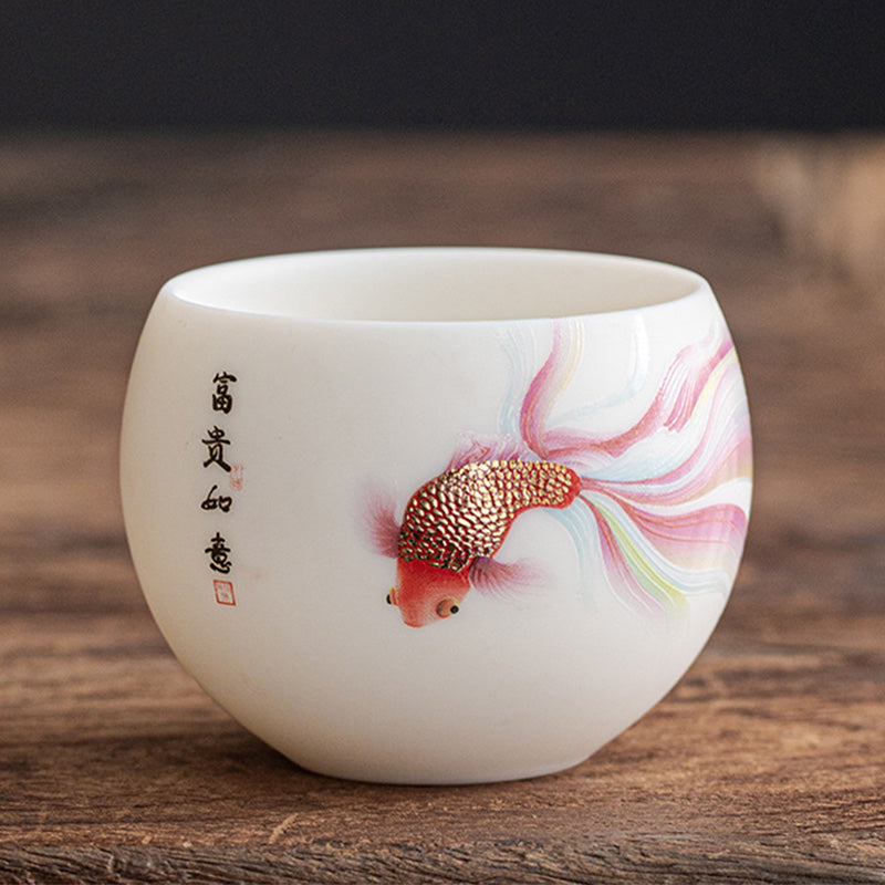Koi Fish Porcelain Teacup - front view showing white ceramic cup with koi fish painting