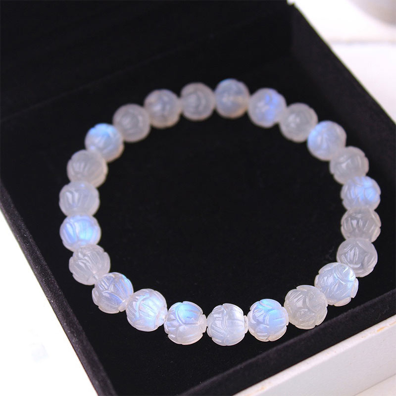 Natural Moonstone Lotus Love Bracelet - overhead showing full bead circle, lotus carving