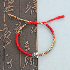 Handmade King Kong Knot Buddha Bracelet – Intricate diamond knot pattern in red cord with Buddha bead, protective wristwear