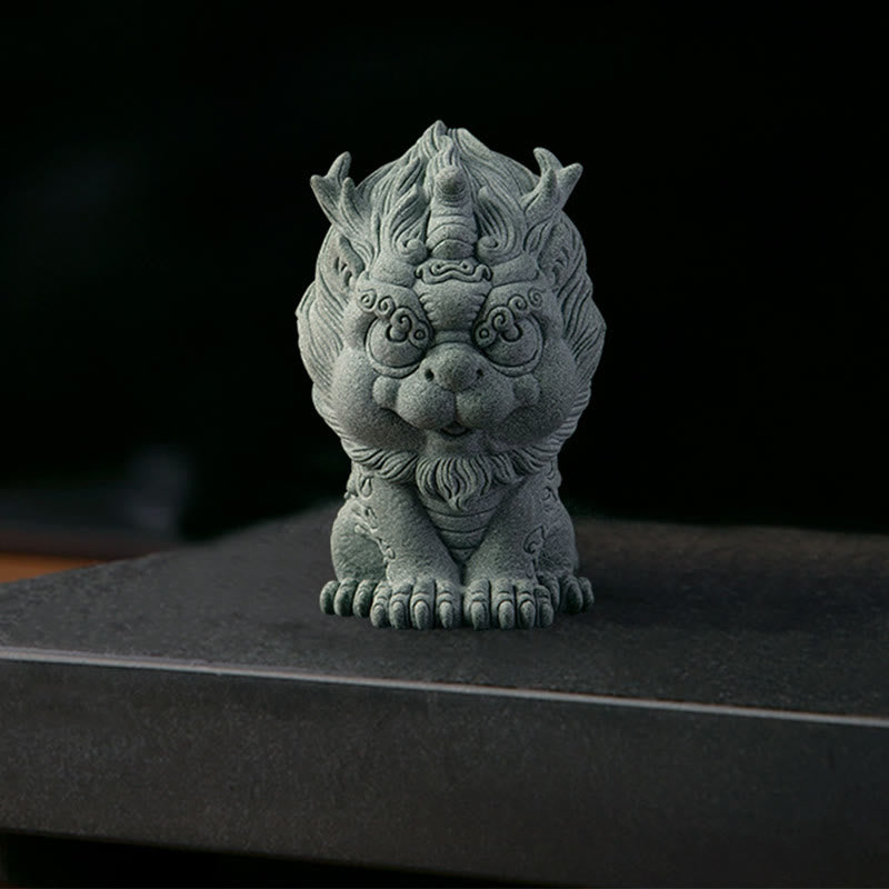 PiXiu Sandstone Statue – Front view on dark stone platform, black background, wealth luck ornament