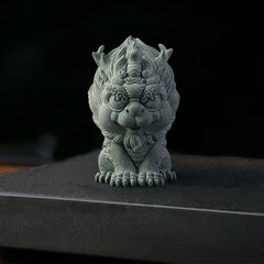 PiXiu Sandstone Statue – Front view on dark stone platform, black background, wealth luck ornament