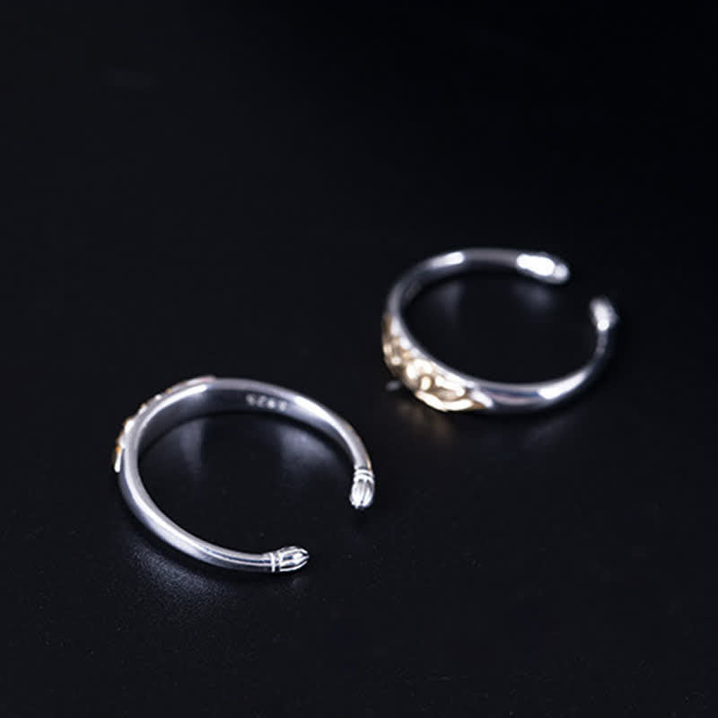 925 Sterling Silver Lotus Ring – Two rings with snake head terminals and 925 stamp on black, sterling silver