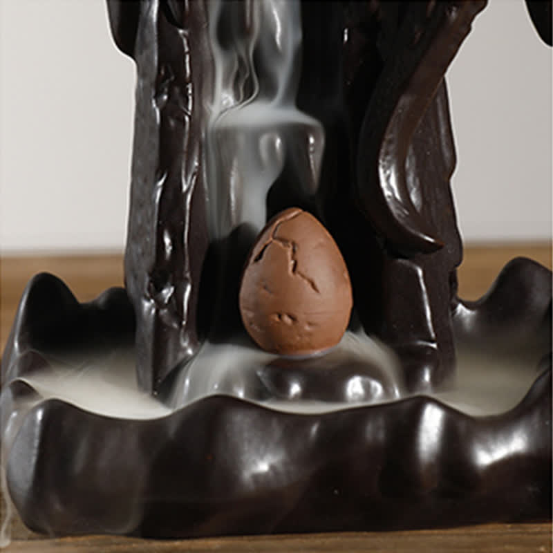 Nordic Dragon Backflow Incense Burner close-up of cone with smoke waterfall flowing down ceramic structure, backflow incense