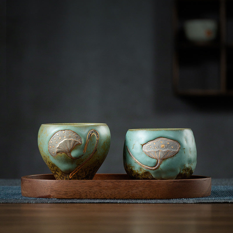Lotus Pod Ceramic Kung Fu Tea Cup - Matching green pair on round tray with ginkgo relief, zen aesthetic