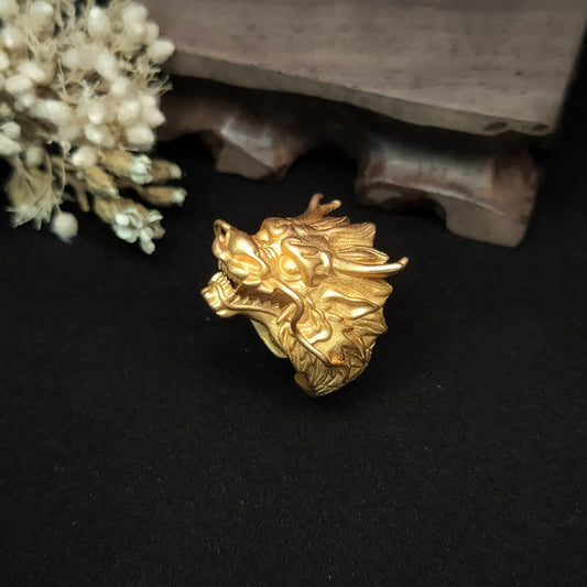Golden Dragon Luck Protection Ring – angled dragon head with open mouth and flowing whiskers on black velvet