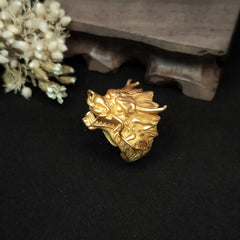 Golden Dragon Luck Protection Ring – angled dragon head with open mouth and flowing whiskers on black velvet