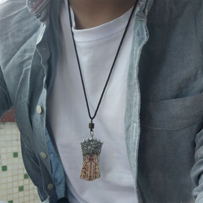 Bagua PiXiu Necklace – Man wearing silver talisman on black cord with denim jacket, spiritual jewelry
