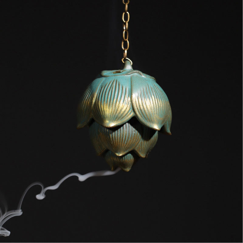 Lotus Hanging Incense Burner - Verdigris bud with brass chain and trailing smoke, backflow incense