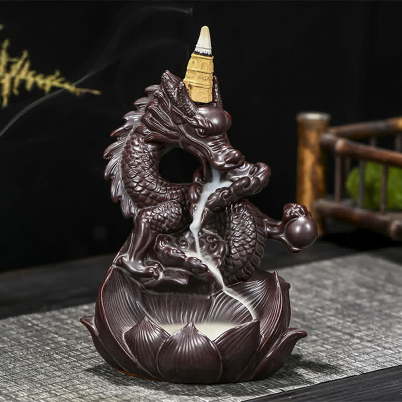 Dragon Lotus Ceramic Incense Burner – Side view of dragon sculpture with cascading smoke on black backdrop, Serene