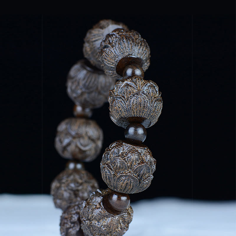 Ebony Wood Eighteen Arhats Lotus Dragon Bracelet - Three-panel lotus Arhat dragon close-up, Heritage Art
