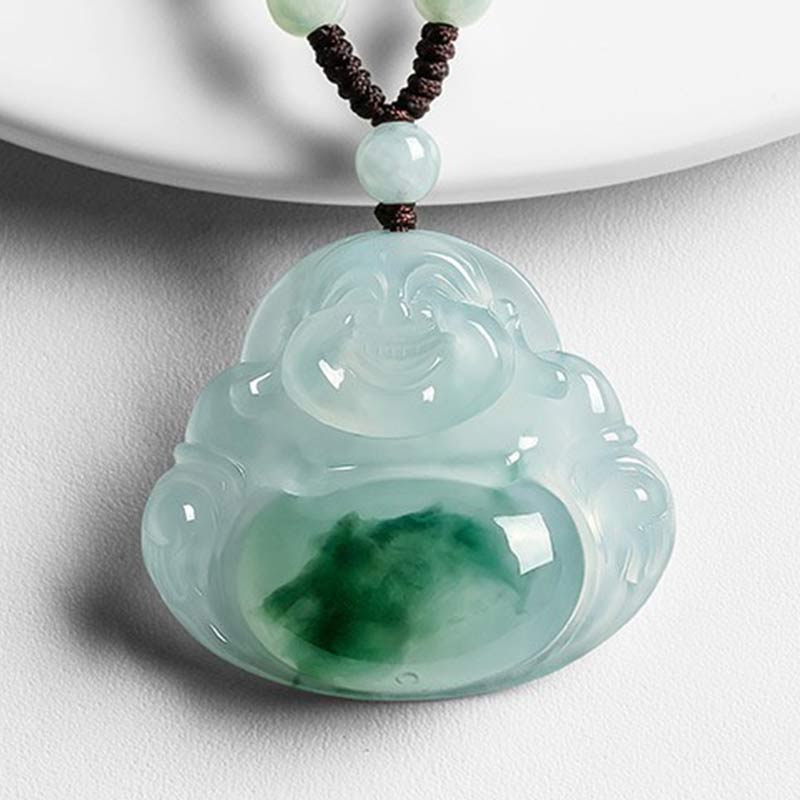 Cyan Jade Buddha Luck Necklace Pendant – smiling Buddha front view on soft white surface in natural light, peace