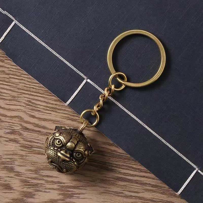 Pixiu Wealth Copper Key Chain – with metal key ring on blue book and wood, alternative style lucky keychain