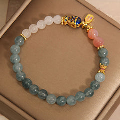 Jade Agate Koi Scripture Bracelet – detail of white jade bead showing translucent quality and polish