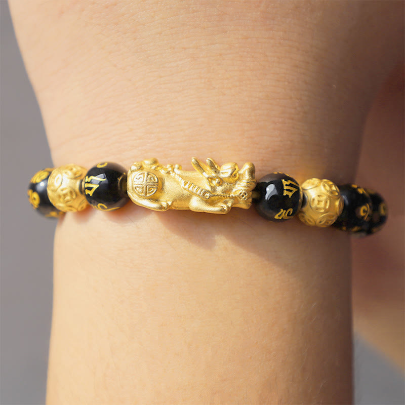 FengShui PiXiu Obsidian Bracelet – wrist side view closeup gold PiXiu black beads, FengShui jewelry