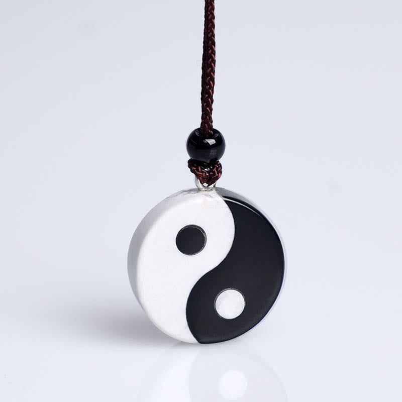 Black Obsidian White Turquoise Yin Yang Strength Fulfilment Necklace Pendant - Obsidian turquoise yin-yang pendant on white, 