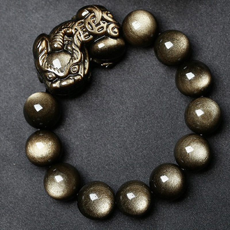 Golden Obsidian Bracelet – Circular layout on black background, shiny gold sheen obsidian beads