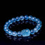 Natural Aquamarine PiXiu Serenity Bracelet – Translucent aquamarine bead bracelet with PiXiu charm on black, healing jewelry