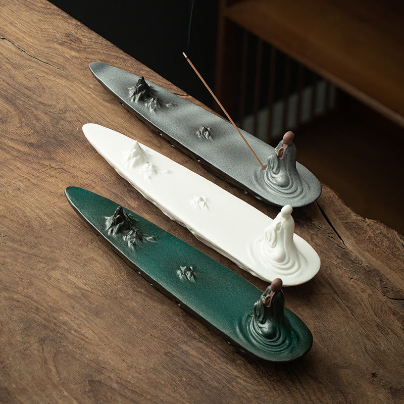 Buddha Monk Sea Wave Mountain Ceramic Incense Burner – Three color variants gray white green with monk and mountain scene, ceramic incense holder