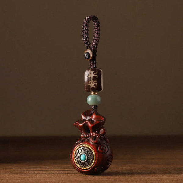 Sandalwood Money Bag Mantra Hanging - Red wood bag with brass medallion, peace blessing charm