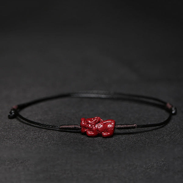 Cinnabar PiXiu Lotus Koi Fish Blessing Braid Bracelet – PiXiu charm on black cord, masculine feng shui wealth bracelet design
