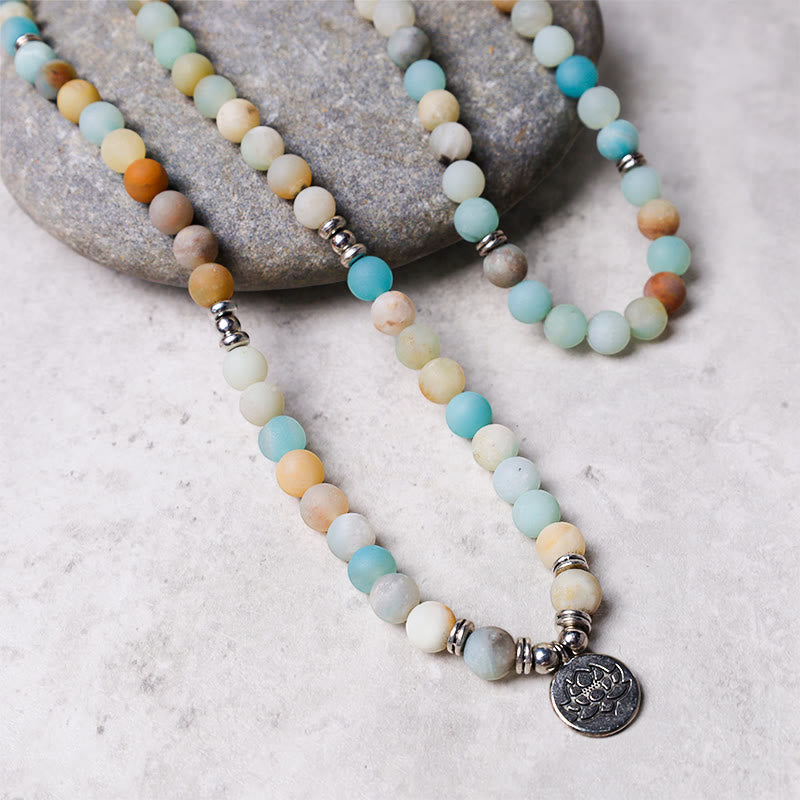Amazonite Lotus Mala – long beaded necklace on gray river stone with lotus pendant, amazonite