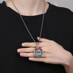 Koi Fish Lotus Ghau Prayer Box Necklace – worn on model with black top, pink lotus pendant with blue enamel accents