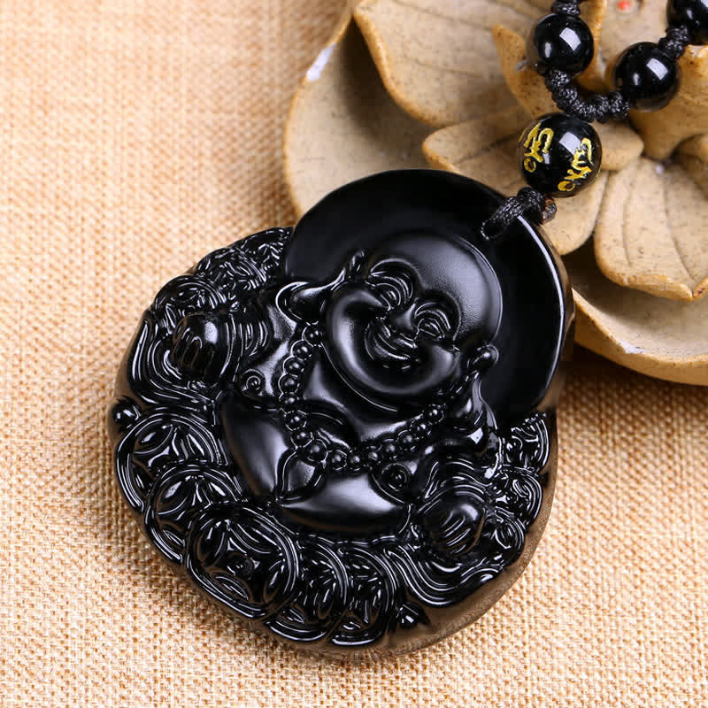 Black Obsidian Laughing Buddha Pendant Necklace – obsidian Laughing Buddha side angle, beige linen flower – side, detail