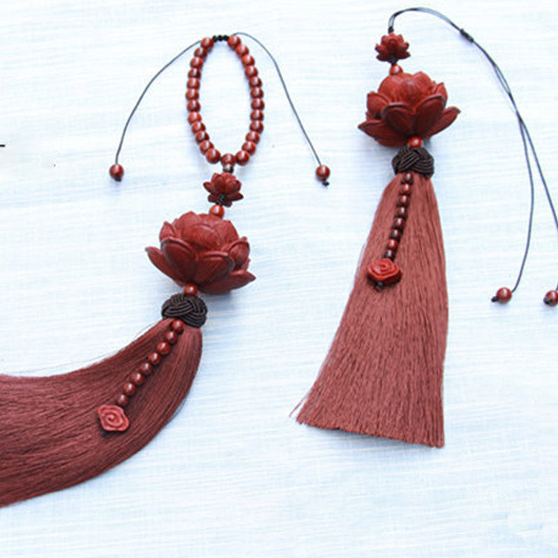 Red Sandalwood Lotus Tassel - two ornaments showing tassel fan and straight drape, silk