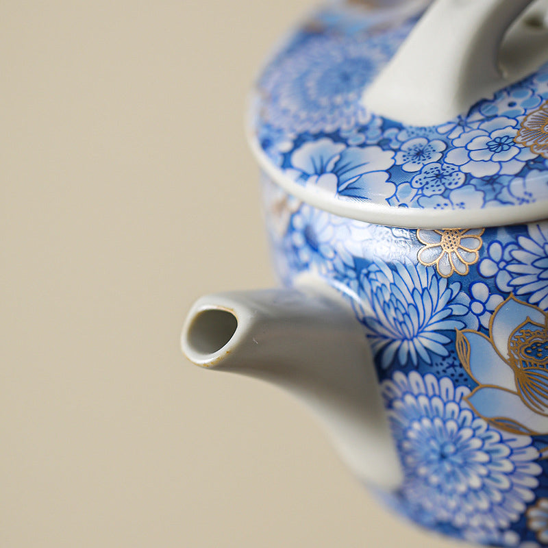 Lotus Chrysanthemum Ceramic Teapot - Macro spout detail with gold floral gilding, craftsmanship