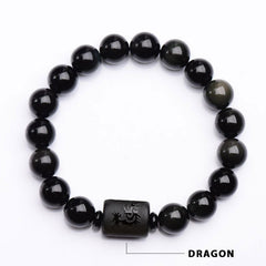 Black Obsidian Phoenix Dragon Bracelet – Dragon carved barrel bead on glossy stones, Power