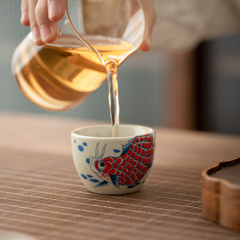 Koi Fish Arowana Cup – back view with sunflower and peony design, ceramic teacup