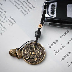 Four Symbols Constellation Key Chain - Bronze dragon pendant keychain at angled view with braided cord, Lucky