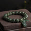 Tibetan Jade PiXiu Prosperity Bracelet – Green jade beads with carved PiXiu on brown stone, abundance luck jewelry
