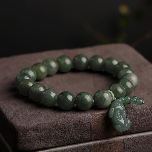 Tibetan Jade PiXiu Prosperity Bracelet – Green jade beads with carved PiXiu on brown stone, abundance luck jewelry