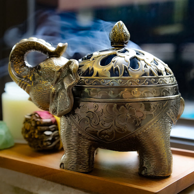 Elephant Alloy Incense Burner – smoke wisps on light wood tray, Serene