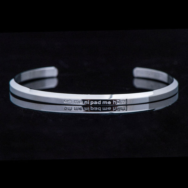 Om Mani Padme Hum Engraved Bracelet – silver cuff front view with mantra engraving, steel bangle