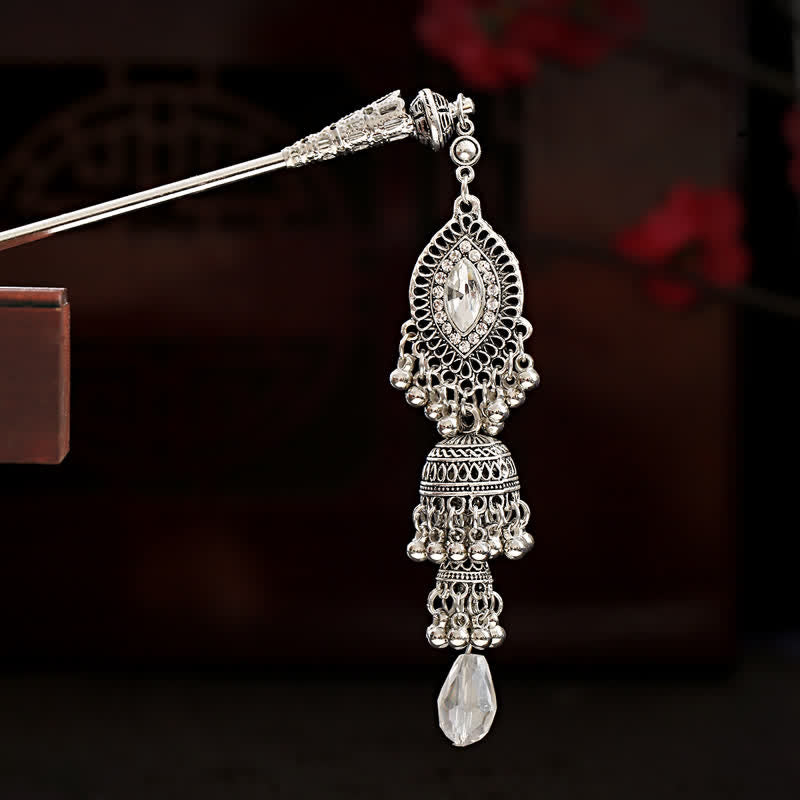 Bell variant oval filigree crystal pendant with double bell tassel