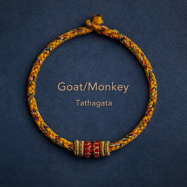 Golden braided cord bracelet for Goat Monkey zodiac with Tathagata Buddha blessing bead, gold and red center charm, adjustable Chinese knot zodiac jewelry