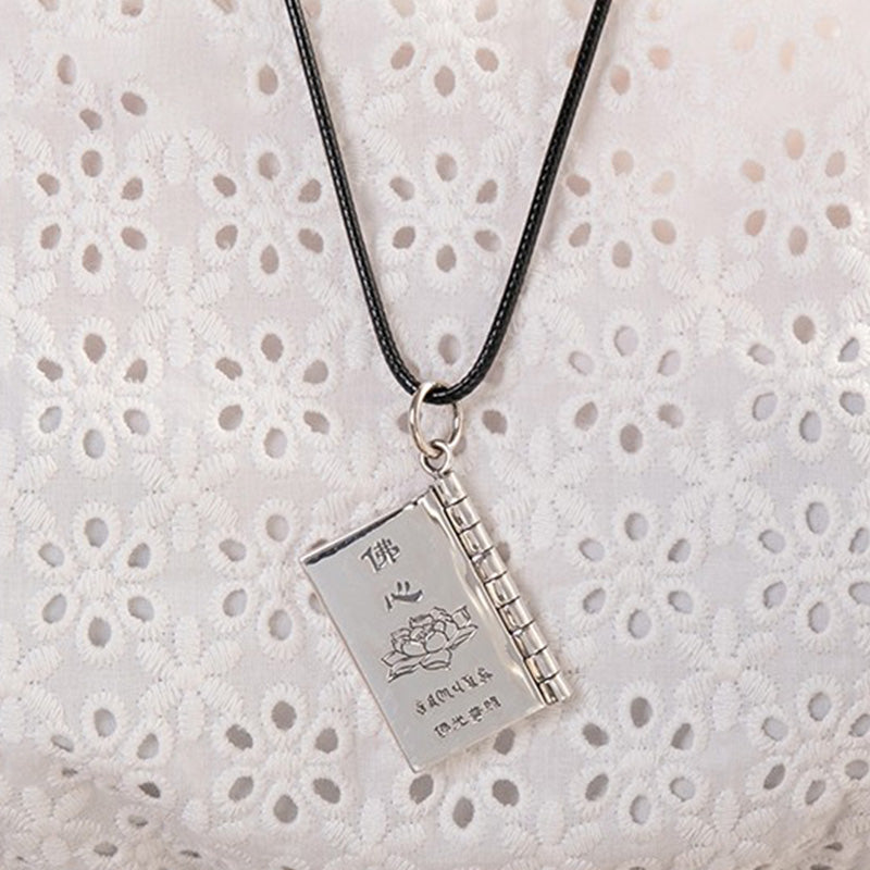 Sterling Silver Heart Sutra Pendant – Open book locket revealing Buddhist scripture, serenity