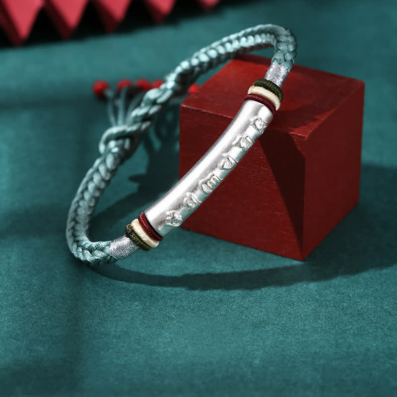 Om Mani Padme Hum Red String Bracelet – Silver cord variant with mantra cylinder on red cube