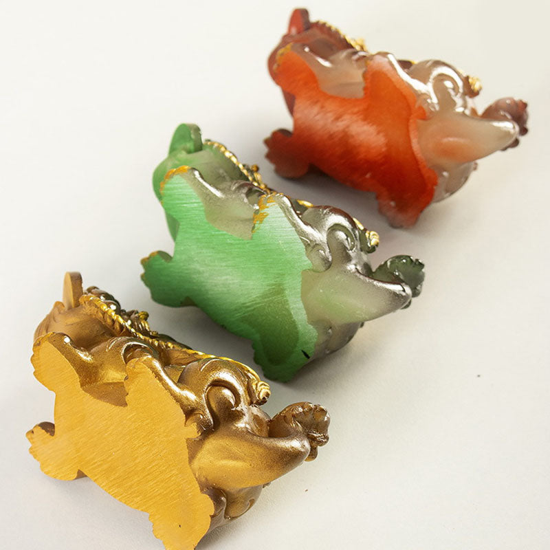 PiXiu Coin Tea Pet – Bottom view of three PiXiu in green, gold and brown, base detail shot