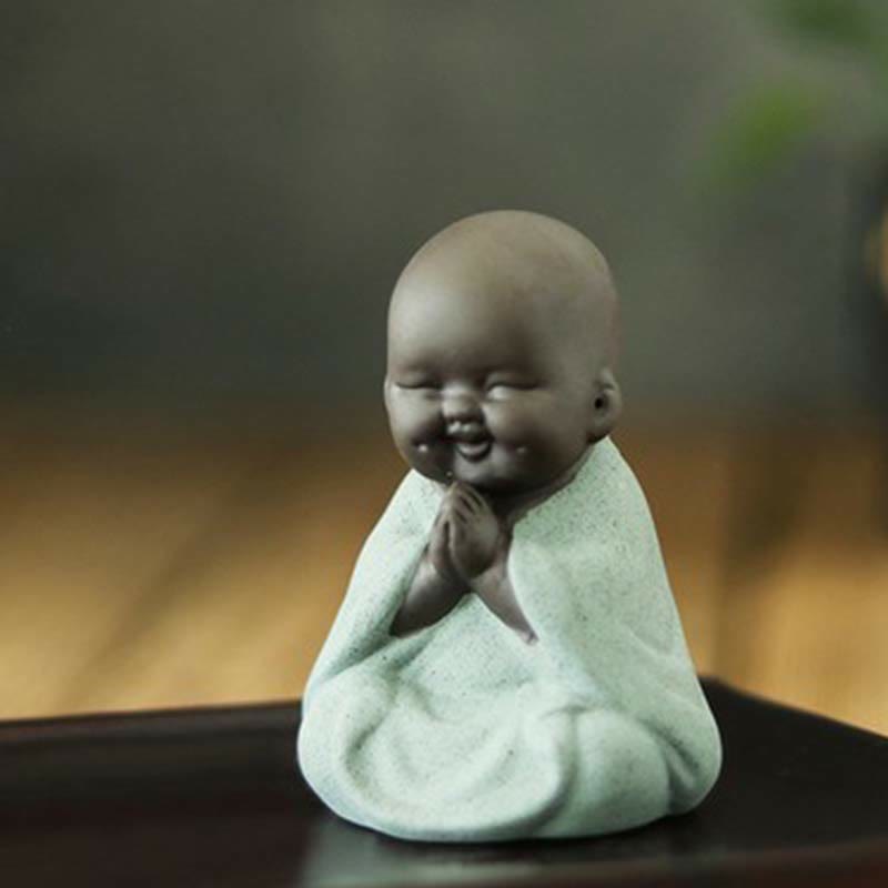 Laughing Buddha Purple Clay Maitreya Statue – colorful variant figures in green pink and coral robes, artisan purple clay series, shallow-focus lifestyle grouping