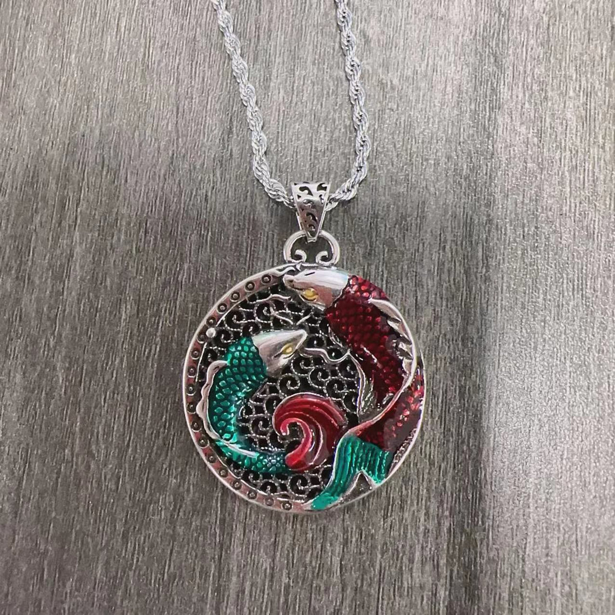 Tibetan Copper Koi Fish Healing Necklace – close-up koi fish carving, intricate scale texture