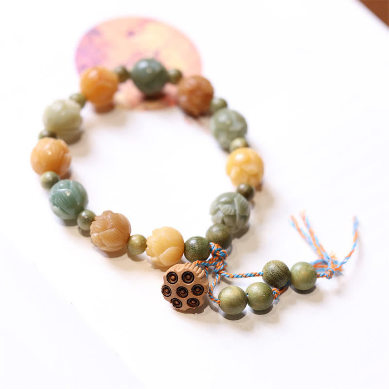 Bodhi Seed Green Sandalwood Lotus Bracelet – carved lotus beads in earthy tones with pod charm, Wisdom