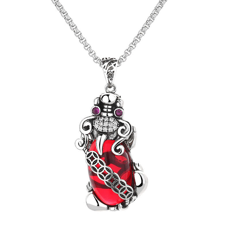 Garnet PiXiu Necklace – Isolated silver and red garnet PiXiu pendant on white background, spiritual gift