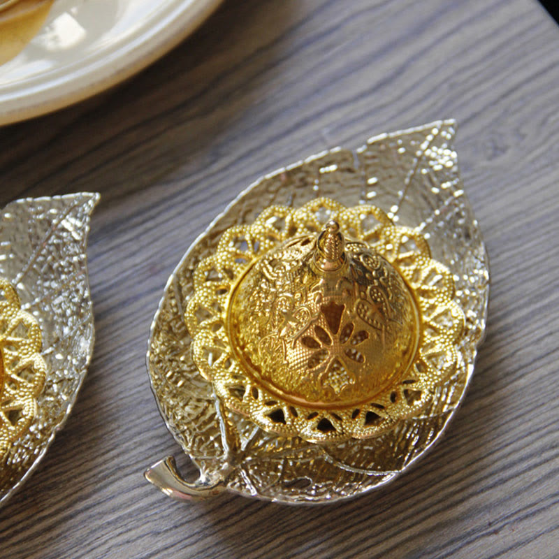 Tibetan Gold Leaf Coaster Incense Burner – Gold and silver turtle motif box on leaf base with filigree detail, brass decorative piece